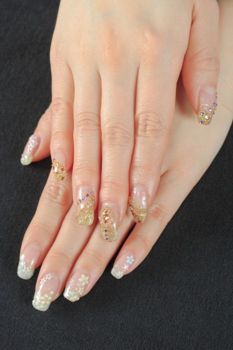 Gold and white nail art
