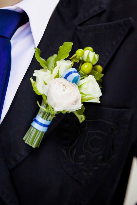 Groom with rose button hole