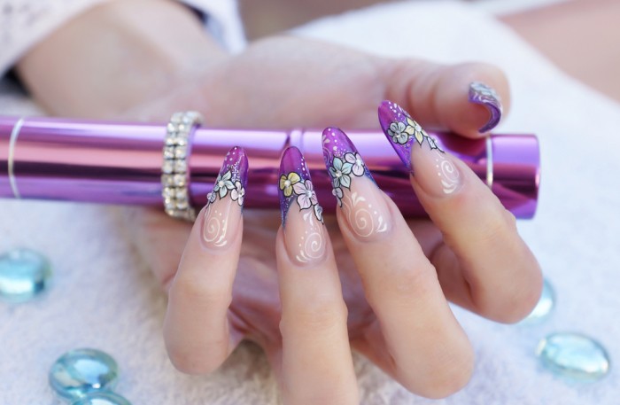 Stunning purple floral nail art design