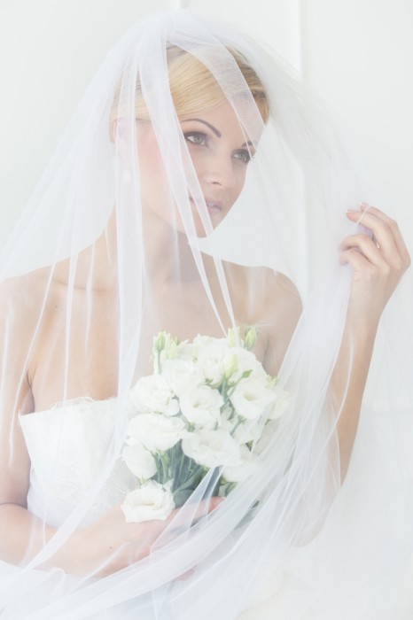 Attractive bride with bouquet