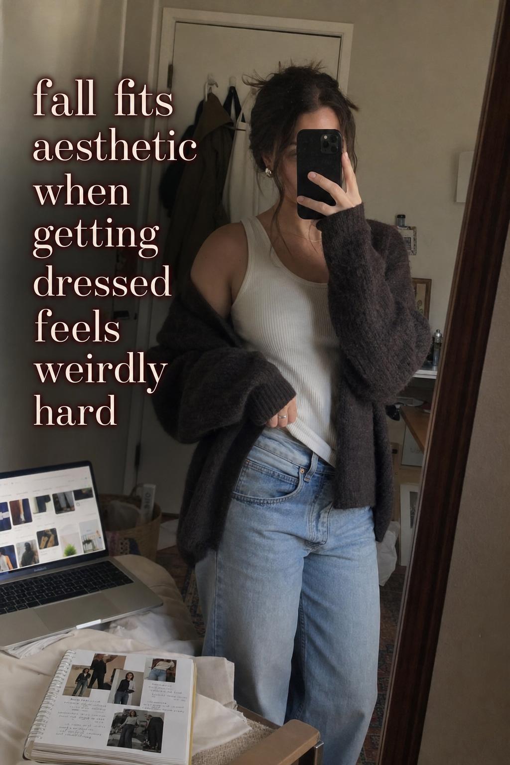 Mirror selfie in a messy bedroom with laptop notes, wearing neutral layers for a fall fits aesthetic outfit
