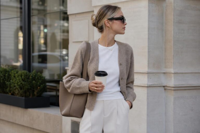 Clean girl fall outfits with cream top, neutral cardigan, straight jeans, and loafers for early autumn layering