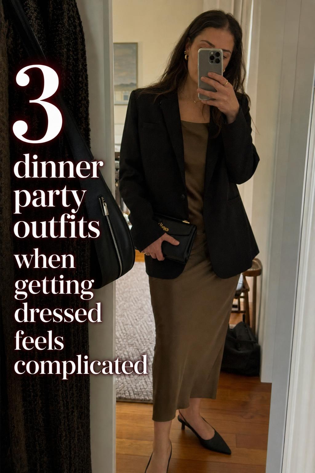 Dinner party outfits mirror selfie in apartment hallway with satin midi dress, blazer, clutch and heels in soft natural light