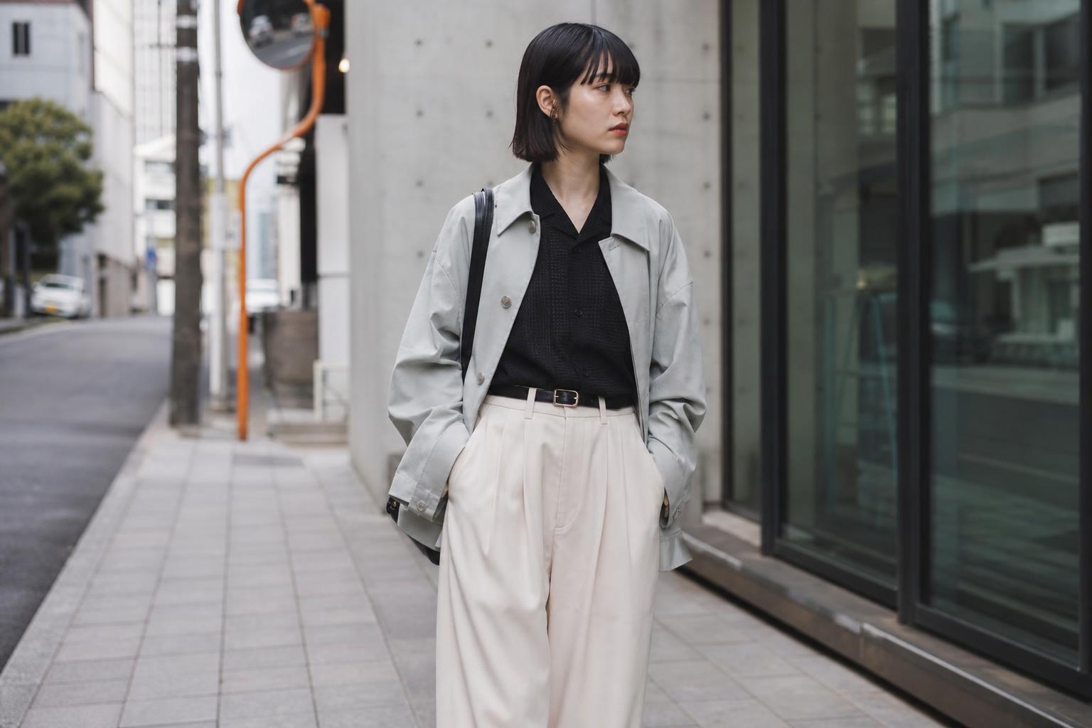 Japanese outfits street style in spring city look with wide-leg trousers, structured jacket, and tonal neutral layers