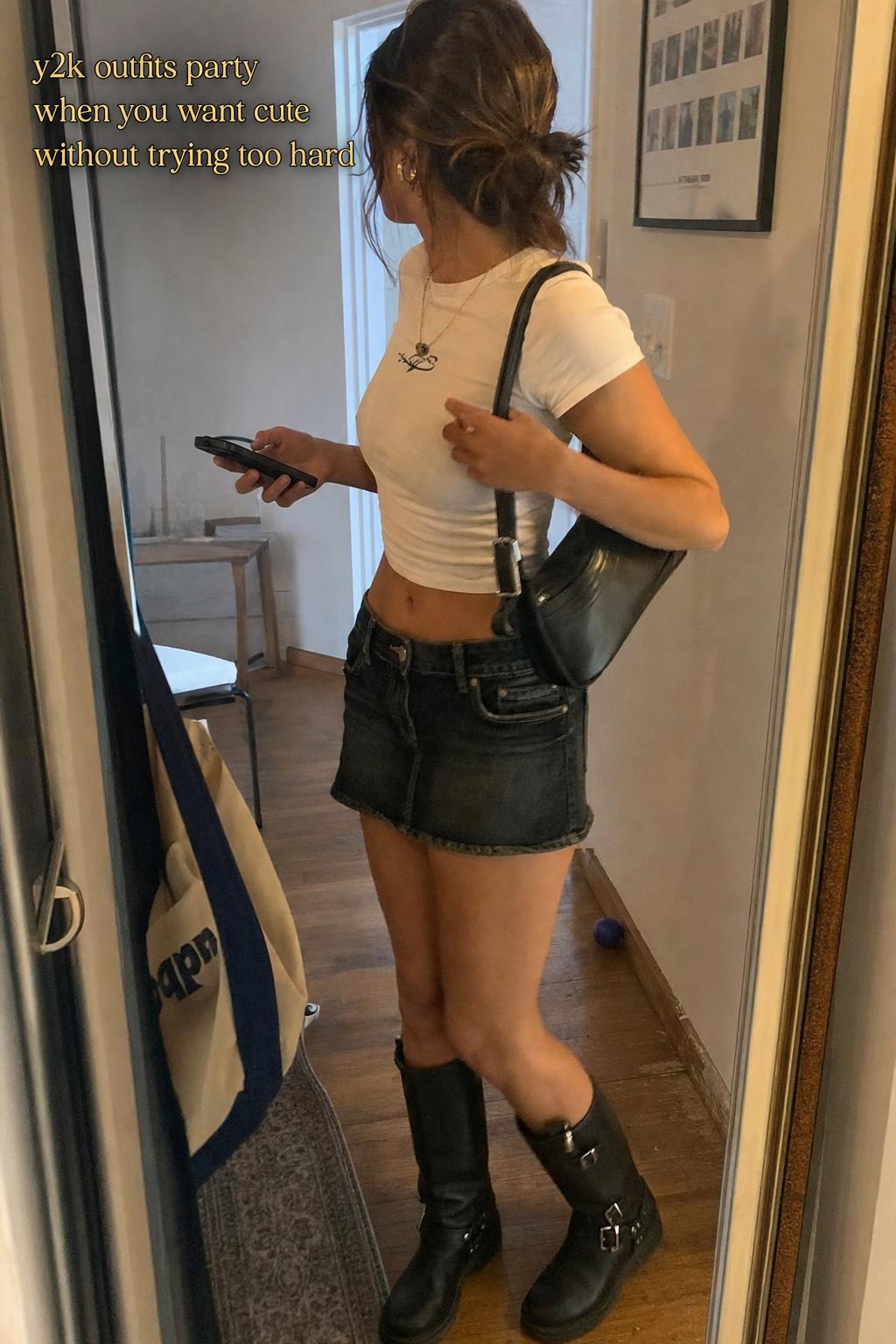 y2k outfits party look in an apartment hallway, young woman in a cropped top and low-rise denim heading out