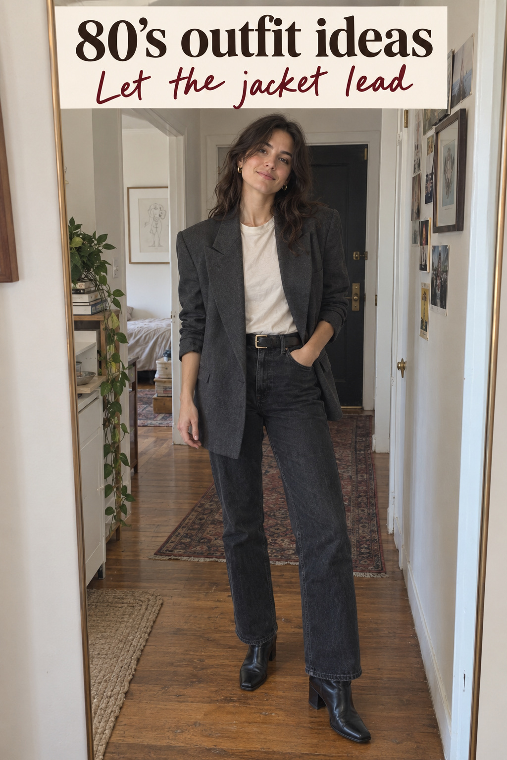 80’s outfit ideas candid mirror look with charcoal blazer, cream tee, jeans and boots