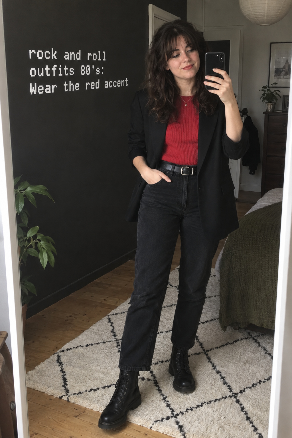 rock and roll outfits 80's candid mirror look with black blazer, red knit, black jeans and boots